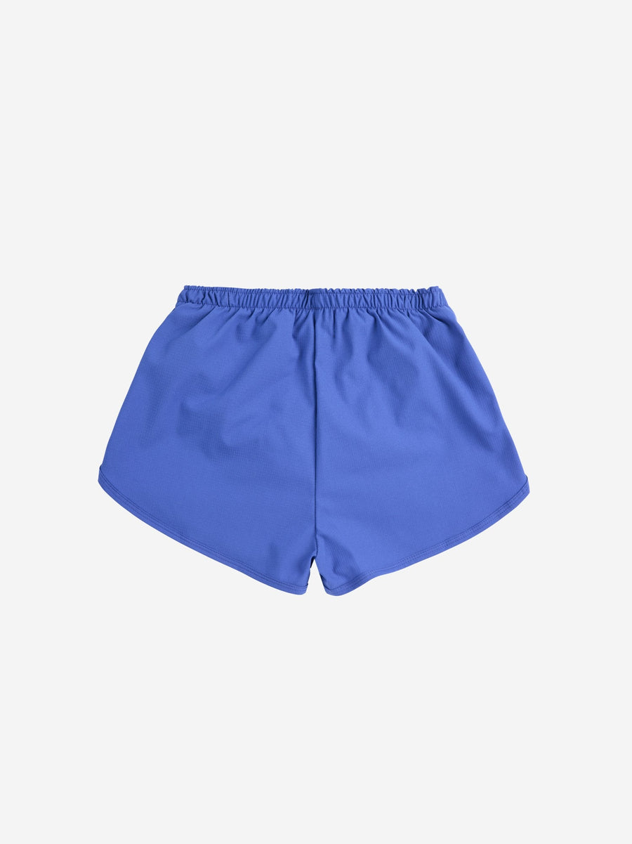 A Day At The Beach Swim Trunks